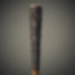Detailed view of a Raiders pool stick showcasing intricate design patterns
