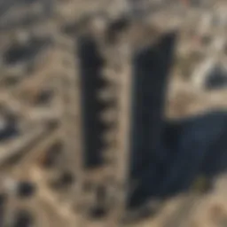 Aerial view of Trinity Towers showcasing its towering architecture amidst ruins