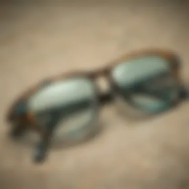 Artistic arrangement of different styles of turquoise tortoise shell glasses on a wooden surface